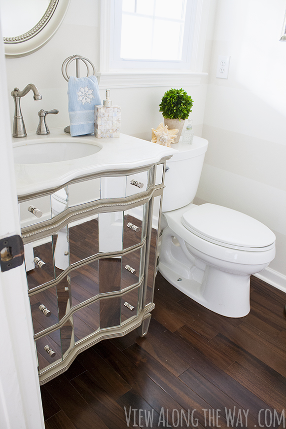 Bathroom Makeover on a tiny budget (even that mirrored vanity!) at www.viewalongtheway.com