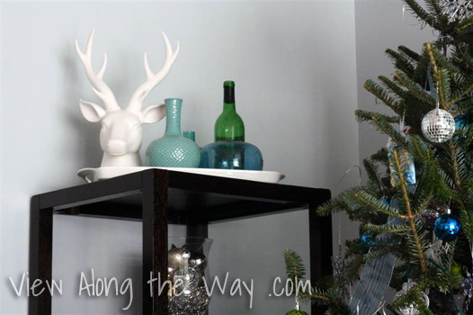 Reindeer decoration with colored vases for Christmas Display