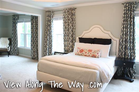 Bedroom with Upholstered Bed and Navy Damask Curtains/Drapery Panels