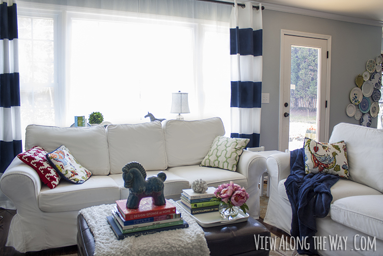 Living Room Design Plan: White Sofa with Striped Curtains