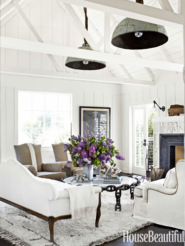 neutral family room with hanging buoy lights