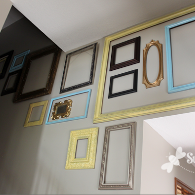 Make a high-impact collage with frames - plus TONS of other inexpensive wall decor ideas!
