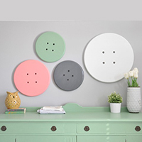 Creative DIY art: oversized buttons! Perfect for a craft room or kids space. (Lots more creative DIY art ideas on this site!)