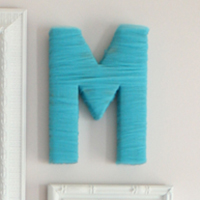 Easy DIY monogram - cover a cardboard letter with tulle! (And LOTS more creative DIY art ideas on this site!