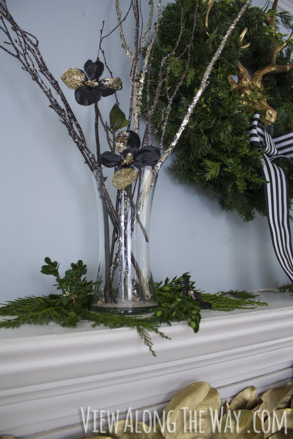 Christmas mantel with twigs and black dogwood