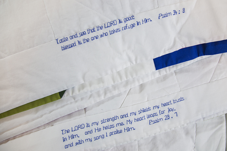 Bible verses embroidered on quilt