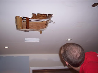Hole in the ceiling after leak