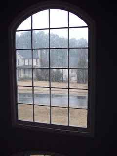 Looking out the window to snow silhouette