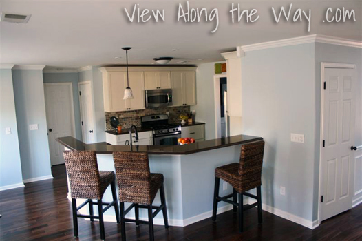 Wicker Barstools, Brittany Blue Walls, White Cabinets, Slate Backsplash Kitchen