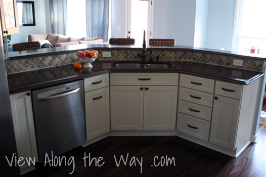 White Cabinets, Oil-Rubbed Bronze Drawer hardware Kitchen