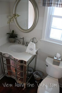 Mirrored bathroom vanity, marble top, brushed nickel hardware