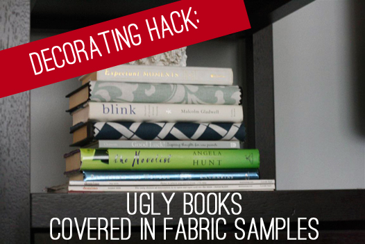 Accessorize your house on the cheap: cover ugly books with fabric samples!