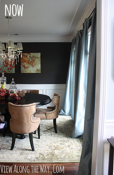 Dining Room: Benjamin Moore Deep Caviar Walls, Upholstered seating, crystal chandelier and chunky white molding