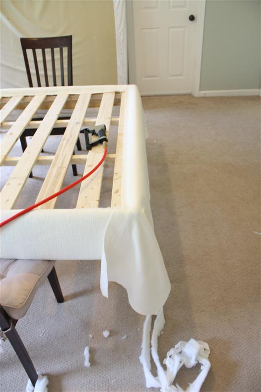 stapling fabric to a bed frame