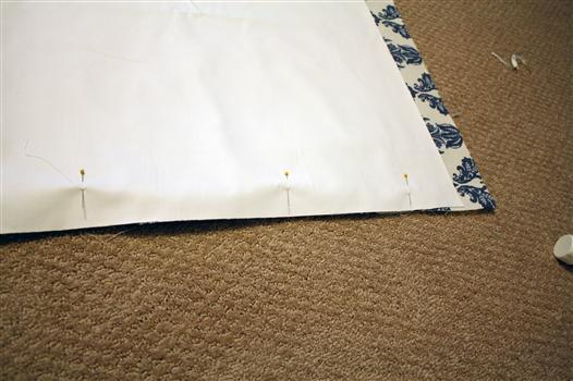 Pin drapery panels to lining