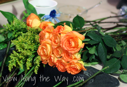 Orange roses and greenery