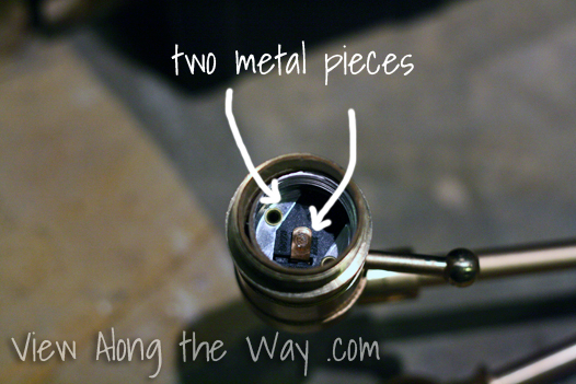 Metal pieces on inside of lightbulb socket