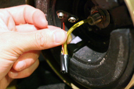 Lamp wires connected to 9-volt battery pack