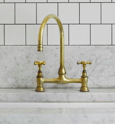 unlacquered brass faucet in home decorating