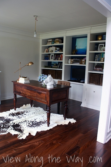 Home office with cowhide rug