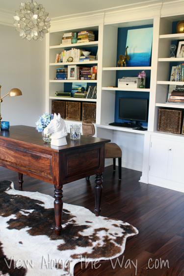 Faux cowhide rug in a home office