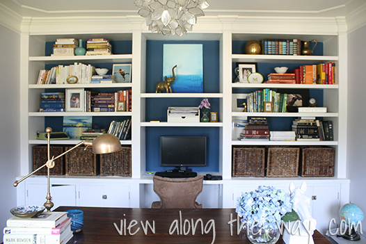 Styled DIY bookshelf wall at www.viewalongtheway.com
