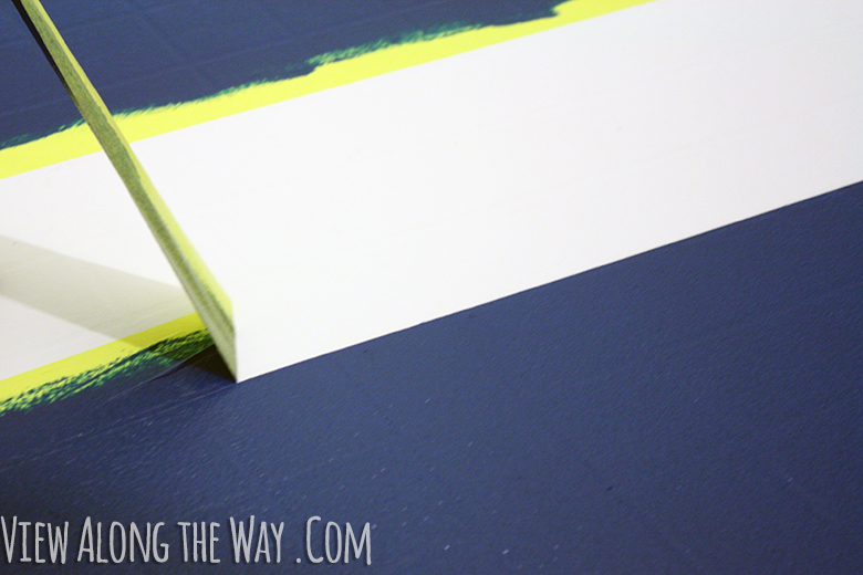 How to paint vinyl/laminate floors! It's easy and inexpensive! Click through for the full tutorial