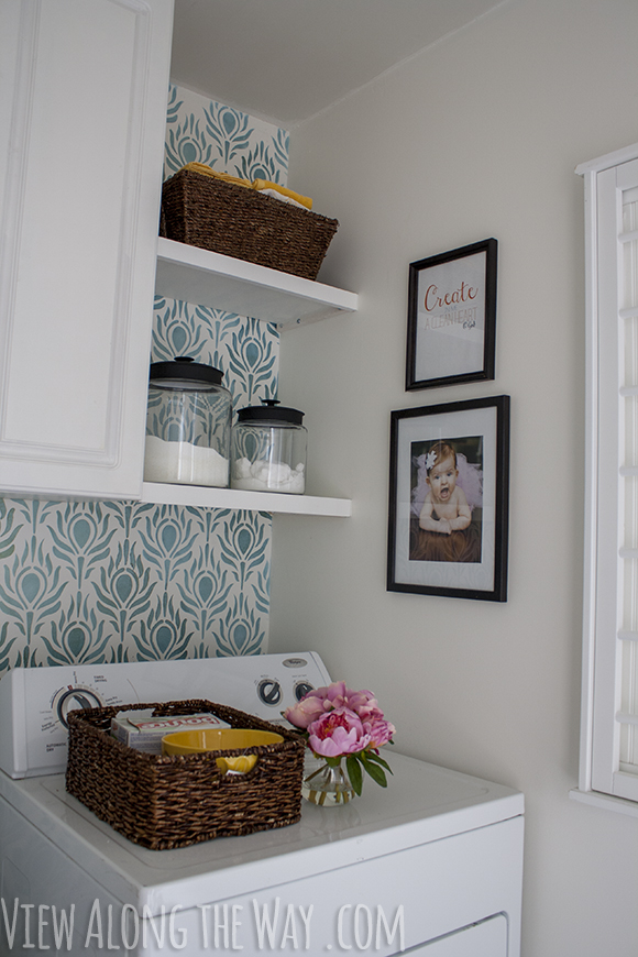 Laundry room makeover for only $157! Painted floors, stenciled walls... come see how it was done!