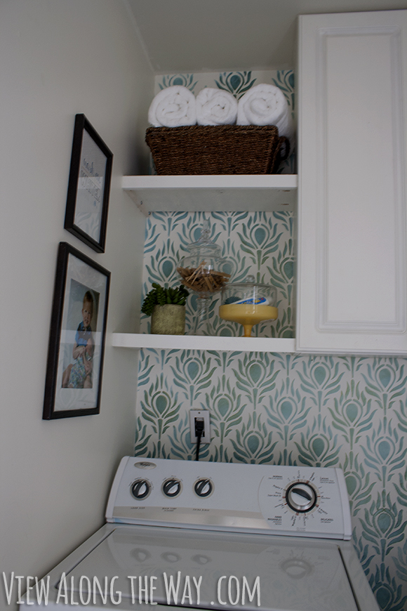Laundry room makeover for only $157! Painted floors, stenciled walls... come see how it was done!