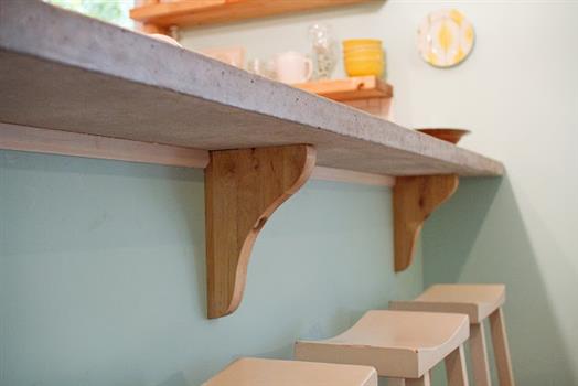 DIY concrete bar top and handmade corbels