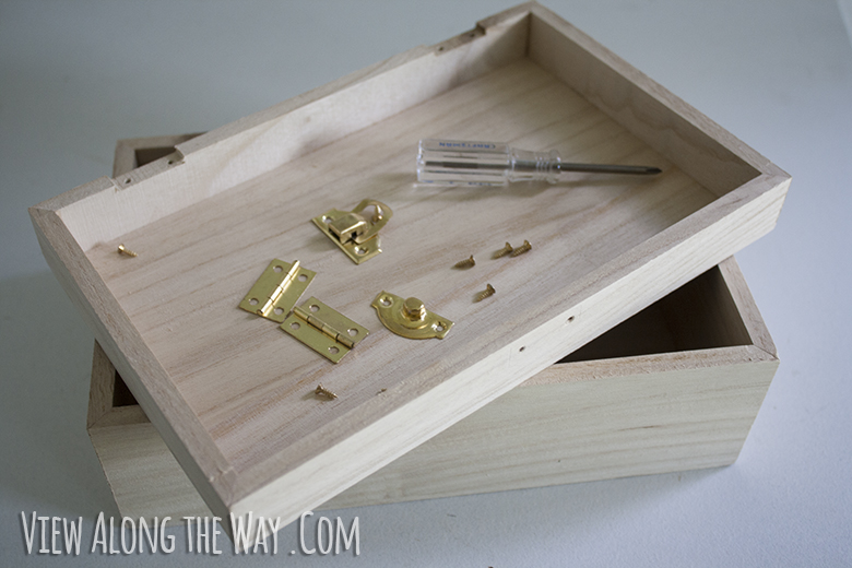 Raw unfinished wood craft box with hardware removed