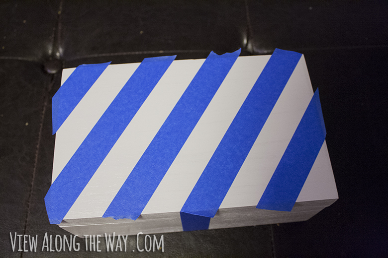 Diagonal stripes on white box