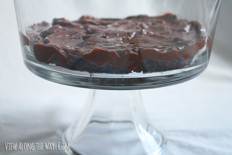 Brownie and pudding layers to make a butterfinger dessert