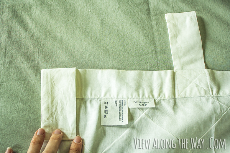 Folding down curtain tabs to sew