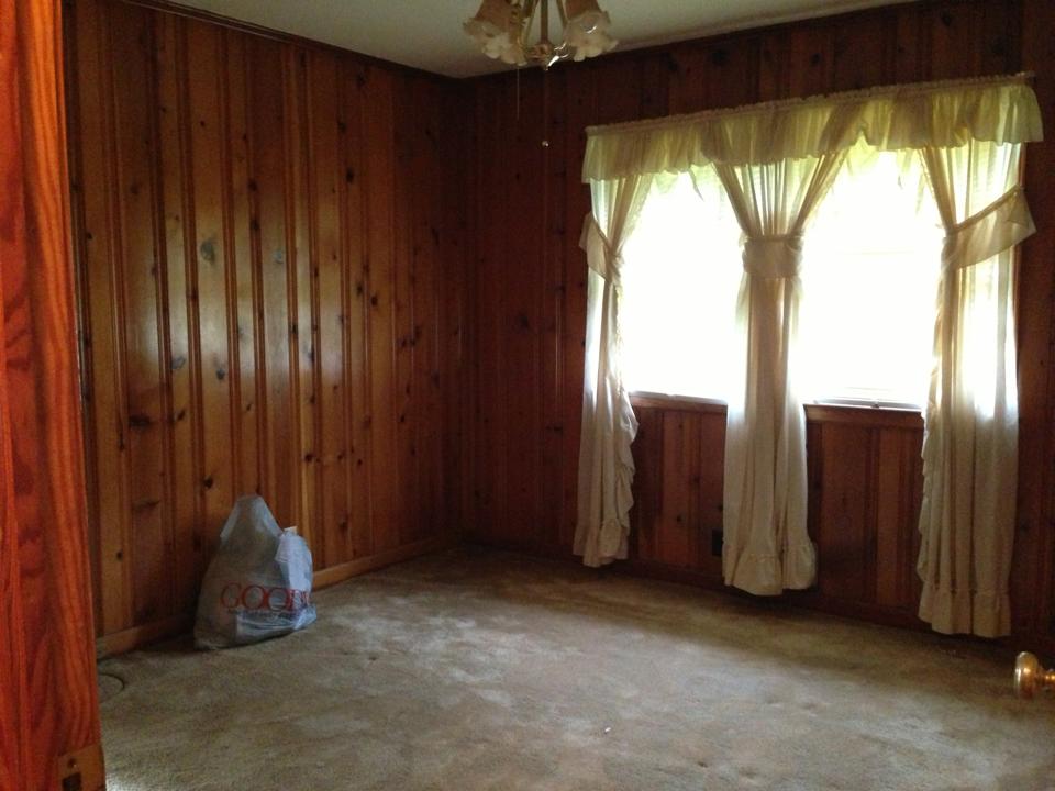 How to decorate around dark wood paneling?