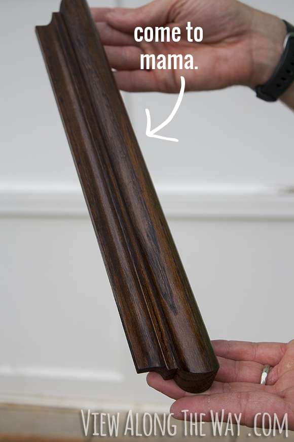 Dark walnut stain on stair railings