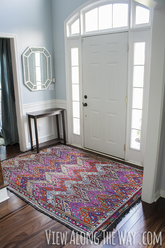 Foyer with colorful Turkish Kilim rug