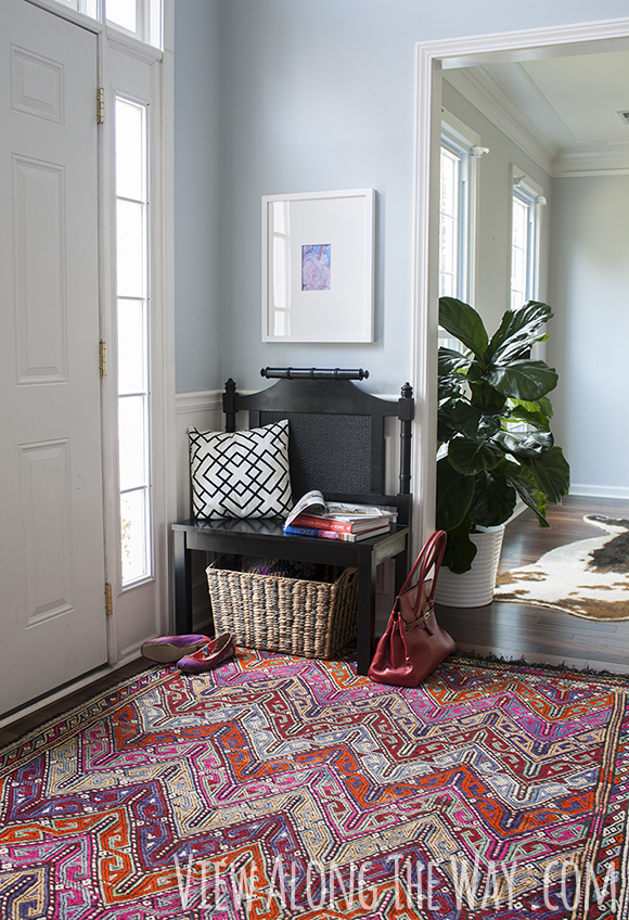 How to turn a headboard into a bench for entryway seating!