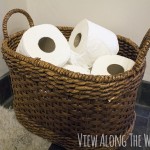 Keep a basket full of toilet paper visible for guest bathrooms - plus other GREAT tips on a luxury guest bath!