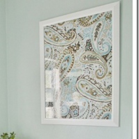 Throw some fabric in a frame for easy DIY art. (Plus check out the other brilliant, inexpensive ideas on this site! So inspiring!)
