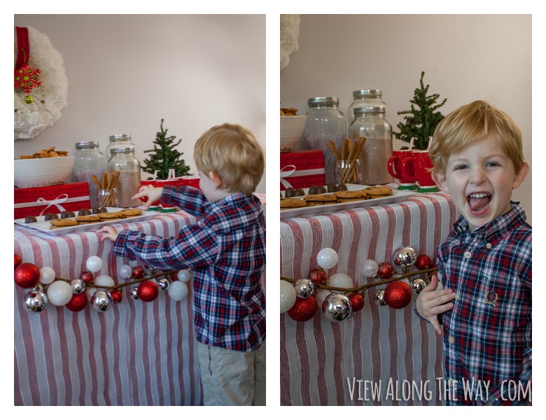 Kids sneaking cookies at holiday table