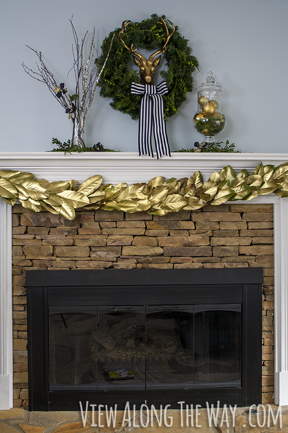 Christmas Mantel at View Along the Way: Brass, black and white and greenery are a magical combination!