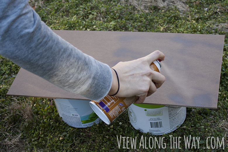 Applying spray adhesive to make velvet drawer lining