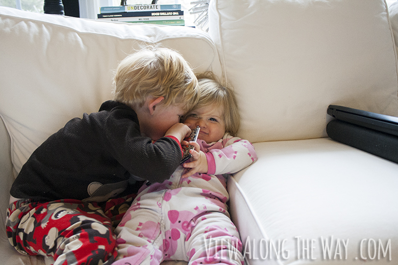 Kids on white sofa