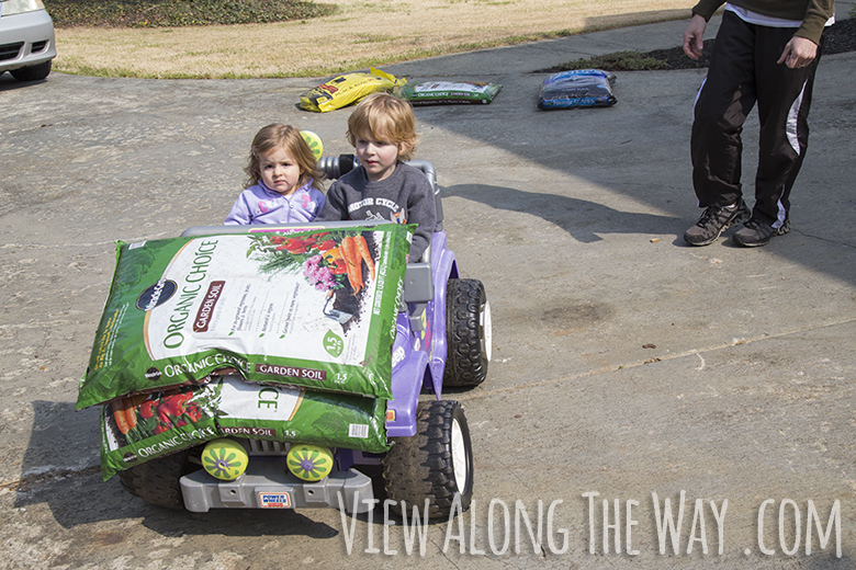 Transporting garden soil with power wheels