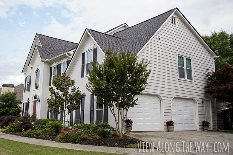 Exterior with new garage doors